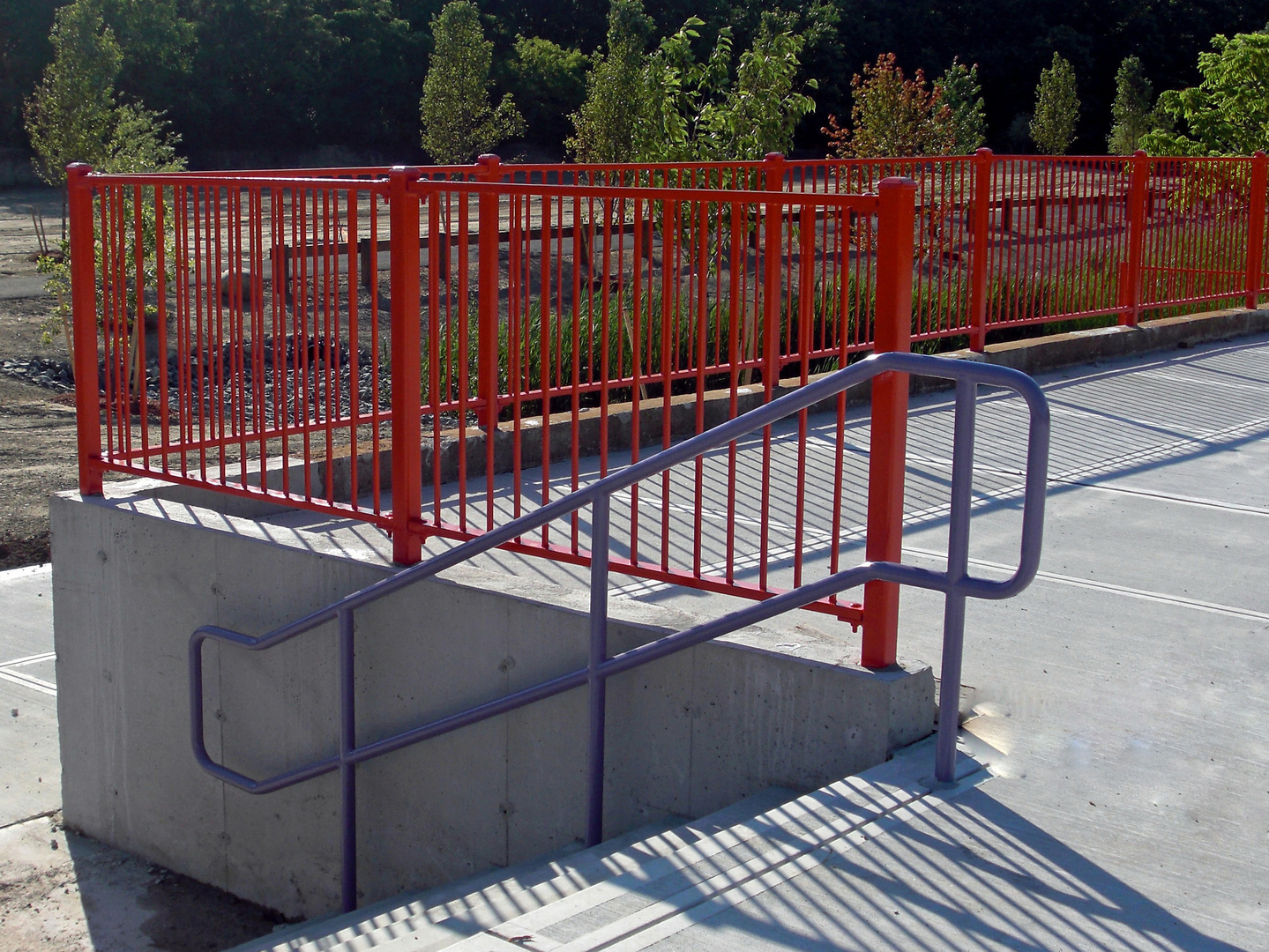 Orange railing work with steel holder